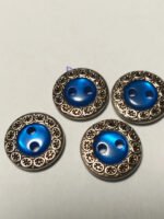 Bouton bleu et argenté